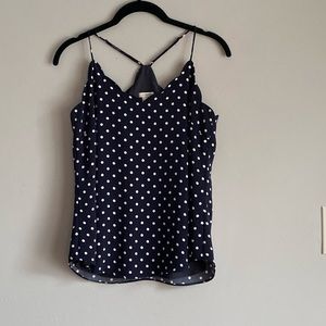 Scalloped blouse with polka dots